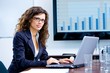Businesswoman working on computer Businesswoman working on computer