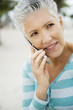 A senior woman using a mobile phone