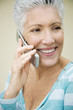 A senior woman using a mobile phone