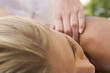 A young woman having a massage