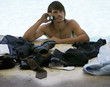 A businessman cooling off in a swimming pool