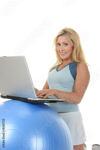 Photo: Woman Using Exercise Ball Desk Woman Using Exercise Ball Desk