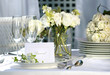 White place card on outdoor wedding table White place card on outdoor wedding table