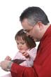 father reading to his toddler daughter father reading to his toddler daughter