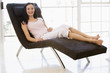 Woman sitting in chair smiling