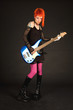 Rock girl playing bass guitar