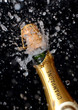 Knallende Champagnerflasche
