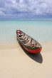 Blue sea with a red boat - Sainte-Marie island - Madagascar.