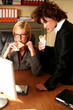 Two women working at the computer