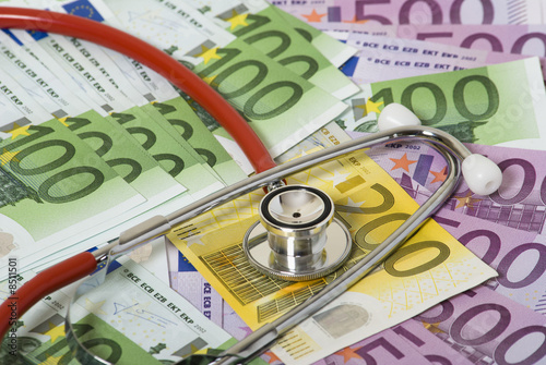 Photo: Money and stethoscope Money and stethoscope