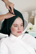 Young woman  having her hair  washed at a salon