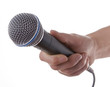Womans hand holding microphone