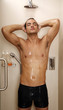 Foto: Man taking a shower at the gym Man taking a shower at the gym