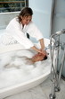 Mature couple having fun in the bathtub