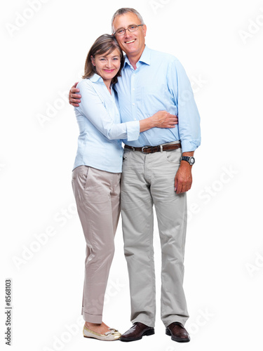 Happy old couple standing together