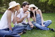 Three friends eating pizza