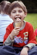 Young boy eating ice cream