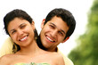 Young Couple Smiling & Hugging  Portrait