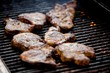 Juicy pork chops on a grill