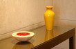 Sidetable with decorative vase and bowl
