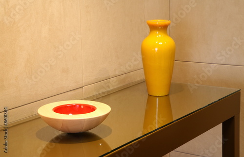 Photo: Sidetable with decorative vase and bowl Sidetable with decorative vase and bowl