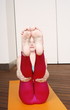 Young woman performing a pilates exercise