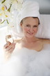 Mature woman enjoying bubble bath