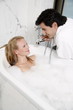 Couple enjoying bubble bath together
