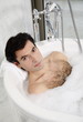 Man enjoying bubble bath