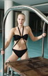 Young woman in a swimming pool at a spa