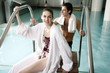 Young couple in a swimming pool at a spa