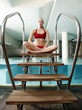 Young woman  in a swimming pool at a spa
