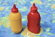 Bottles of ketchup and mustard