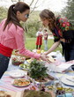 Young women at barbecue