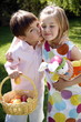 Little boy and girl with Easter egg basket