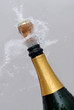 Knallende Sektflasche