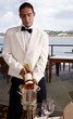 Waiter displaying wine bottle