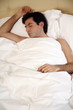Man sleeping in bed