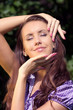 Foto: Portrait of the girl in a summer garden Portrait of the girl in a summer garden