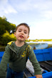 little boy in boat