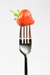 Fork and strawberry