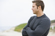 Photo: Man standing at beach Man standing at beach