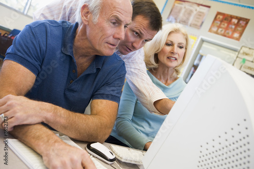 Photo: Mature students learning computer skills Mature students learning computer skills