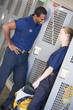 Firefighters in the fire station locker room