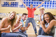 Foto: Family in bowling alley with two friends cheering and smiling Family in bowling alley with two friends cheering and smiling