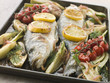 canvas print picture Whole Sea Bass Roasted with Fennel Lemon Garlic and Cherry Tomat
