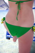 Rear end of woman wearing bikini