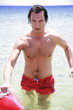 Man in water on the beach