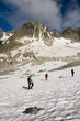 Three climbers on access to high peaks