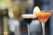 Close up of glasses filled with cocktails.
